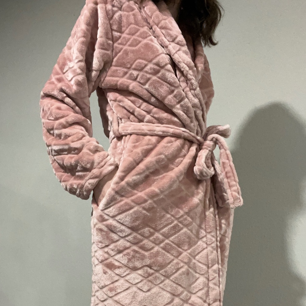 Pink fuzzy bath robe